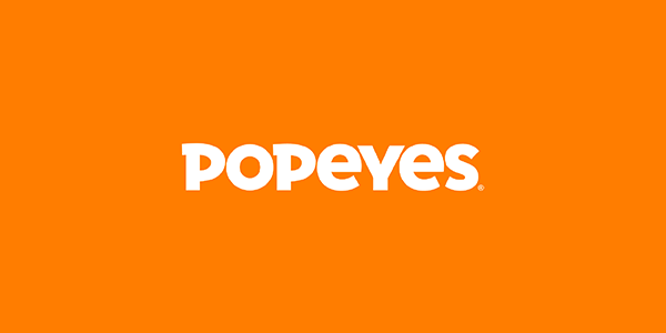 Popeyes logo on an orange background