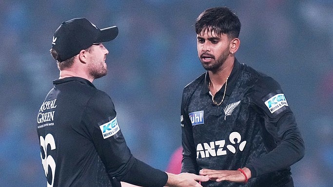 AP : New Zealand's Adithya Ashok, right, celebrates with teammate Henry Nicholls the wicket of India's captain Shubman Gill during the first ODI in Vadodara.