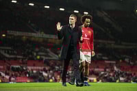 | Photo: AP/Jon Super : Manchester United's interim manager Darren Fletcher and Manchester United's Joshua Zirkzee walk off the pitch after the FA Cup third round soccer match between Manchester United and Brighton in Manchester, England.