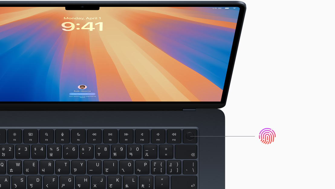 打開的太空黑色 MacBook Pro，展示 Touch ID 按鈕的位置。