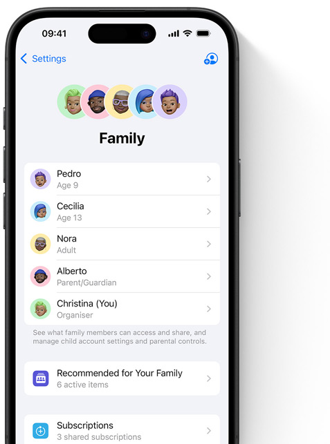 iPhone screen showing the Family page in Settings, Memoji of individual family members, each set against its own colourful circle, arrayed at the top, same Memoji in a list beneath them showing all members of the Family Sharing group