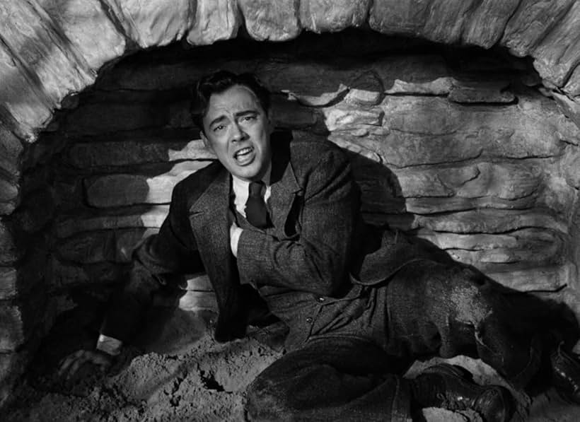 John Beal in Edge of Darkness (1943)