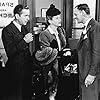 Humphrey Bogart, Mary Astor, and Jerome Cowan in The Maltese Falcon (1941)