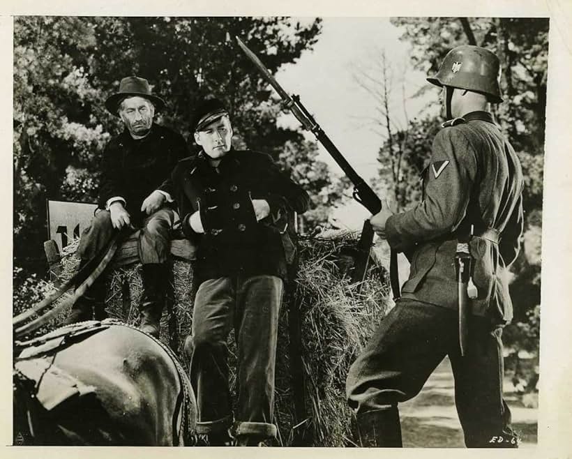 Errol Flynn and Art Smith in Edge of Darkness (1943)