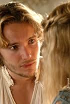 Toby Regbo and Yael Grobglas in Reign (2013)