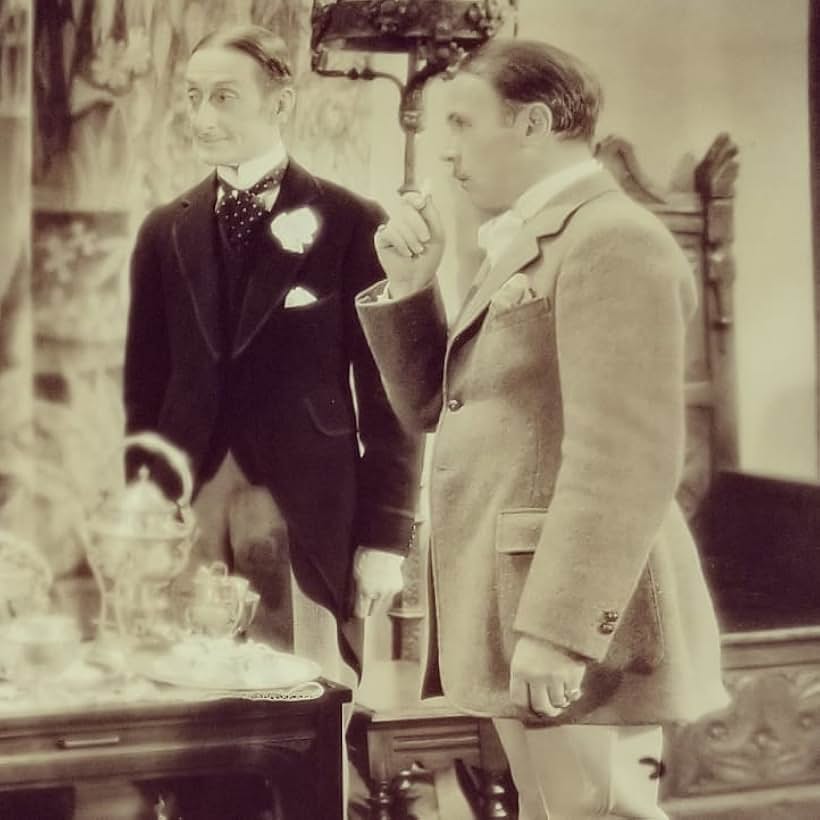 Edgar Norton and Roland Young in A Lady's Profession (1933)