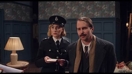 In the West End of 1950s London, plans for a movie version of a smash-hit play come to an abrupt halt after a pivotal member of the crew is murdered. When world-weary Inspector Stoppard (Sam Rockwell) and eager rookie Constable Stalker (Saoirse Ronan) take on the case, the two find themselves thrown into a puzzling whodunit within the glamorously sordid theater underground, investigating the mysterious homicide at their own peril.