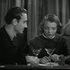 Basil Rathbone and Jane Bryan in Confession (1937)