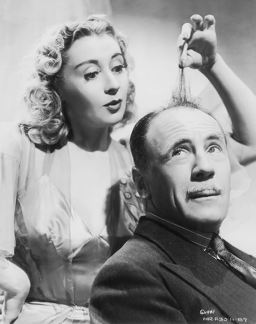 Joan Blondell and Roland Young in Topper Returns (1941)