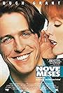 Julianne Moore and Hugh Grant in Nove Meses (1995)