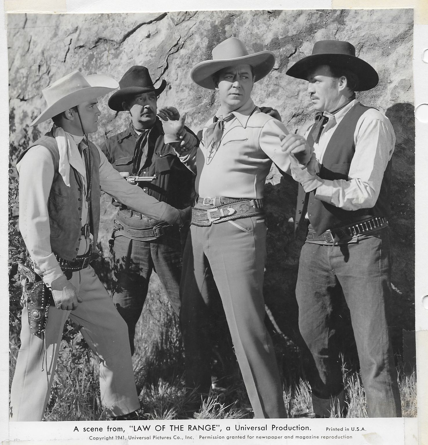 Johnny Mack Brown, Riley Hill, Charles King, and Ethan Laidlaw in Law of the Range (1941)