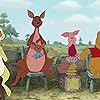 Jim Cummings, Tom Kenny, Travis Oates, Kristen Anderson-Lopez, and Wyatt Dean Hall in Winnie the Pooh (2011)