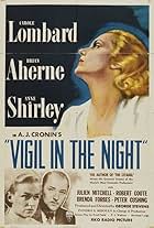 Brian Aherne and Carole Lombard in Vigil in the Night (1940)