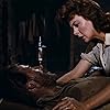 Susan Hayward and Hugh Marlowe in Garden of Evil (1954)