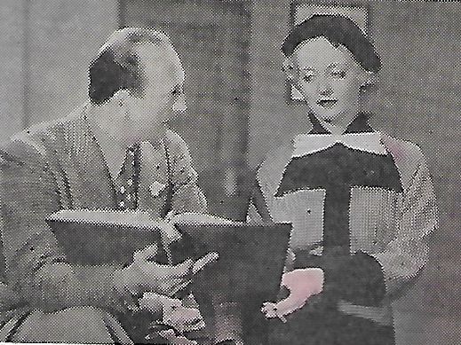 Bette Davis and Michael Curtiz in Front Page Woman (1935)