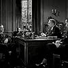 Humphrey Bogart, Creighton Hale, and John Hamilton in The Maltese Falcon (1941)