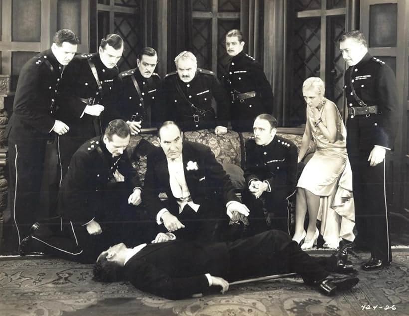 Gerald Barry, Lionel Belmore, John Loder, John Miljan, Natalie Moorhead, John Roche, Philip Strange, Ernest Torrence, Richard Travers, Richard Tucker, and Roland Young in The Unholy Night (1929)