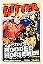 Charles King and Tex Ritter in The Mystery of the Hooded Horsemen (1937)