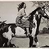 Gregory Peck, Dice, and Jennifer Jones in Duel in the Sun (1946)