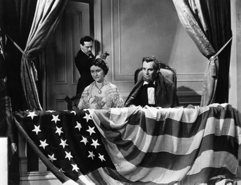 Kay Hammond, Walter Huston, and Ian Keith in Abraham Lincoln (1930)