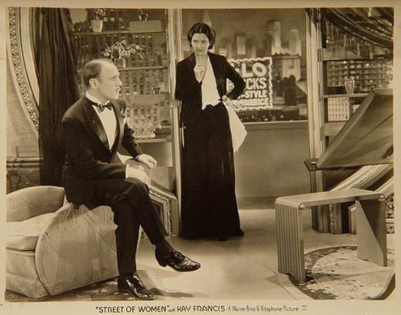 Kay Francis and Roland Young in Street of Women (1932)