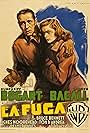 Lauren Bacall and Humphrey Bogart in La fuga (1947)