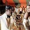 Sonia Braga and Sammy Davis Jr. in Moon Over Parador (1988)