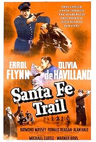 Olivia de Havilland, Errol Flynn, Ronald Reagan, and Raymond Massey in La piste de Santa Fé (1940)