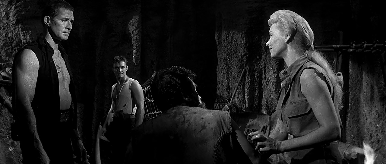 Henry Brandon, Jock Mahoney, Shirley Patterson, and William Reynolds in The Land Unknown (1957)