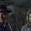 Telly Savalas and Camilla Sparv in Mackenna's Gold (1969)