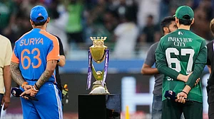 AP/Altaf Qadri : India's captain Suryakumar Yadav, left, and Pakistan's skipper Salman Agha wait for the coin toss of the Asia Cup final.