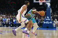 NBA 2026: Charlotte Hornets Hand Oklahoma City Thunder Shock 124-97 Home Loss | Photo: AP/Kyle Phillips : Charlotte Hornets forwarad Miles Bridges, right, pushes past Oklahoma City Thunder guard Isaiah Joe during the second half of an NBA basketball game, in Oklahoma City.