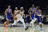 NBA 2026: Denver Nuggets Edge Philadelphia 76ers 125-124 In Overtime | Photo: AP/Matt Rourke : Denver Nuggets' Bruce Brown (11) tries to get past Philadelphia 76ers' Tyrese Maxey, right, during overtime of an NBA basketball game in Philadelphia.
