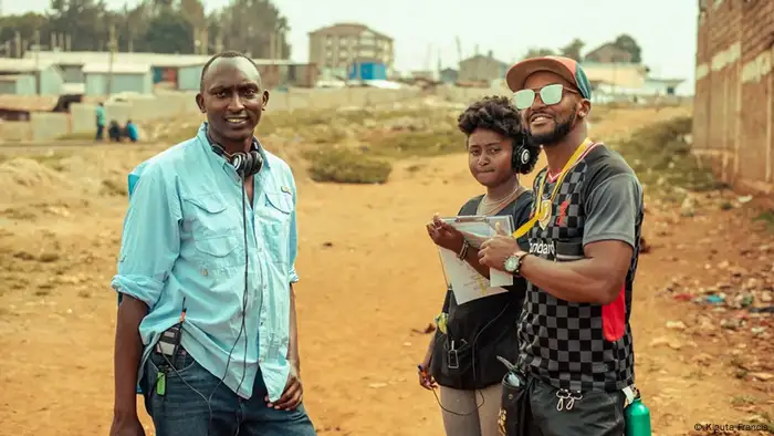 Vincent Mbaya stands in a field in Nairobi, Kenya