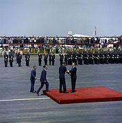 U.S. President John F. Kennedy greeting Mexican president Adolfo López Mateos at Mexico City International Airport in June 1962.