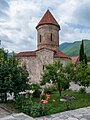 Stone church with a garden