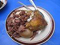 Gudeg (left), the unripe jackfruit curry in reddish color acquired from teak leaf, a specialty of Yogyakarta in Java.