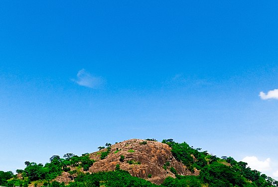 Ekiti State in Nigeria is known to be a place surrounded by hills. (ÈKITI) is a Yoruba language meaning high hill. This is oloke meji hill in the capital city of Ado Ekiti, in Ekiti State Nigeria. Photograph: User:Abiolablaze1