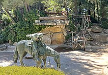 At the shallow basin to the Maynard's Mountain waterfall, Paso Robles Event Center displays a thousand-pound, clay-sculpted bronze statue of a horseback cowboy seeking a drink, entitled "Cool Water."