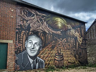 Fresque géante, représentant Bourvil, réalisée par Romain Vasse alias Atomik