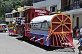 Carro alegórico representando al ferrocarril que hacia parada en la parroquia Piedras.