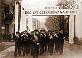 An ethnic Polish military band in Karviná welcoming Poland's annexation of Zaolzie in 1938. The banner reads, "We have awaited you for 600 years."