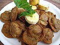 Banana pakora, made from green raw banana slices dipped in Singhara flour (water chestnut flour).