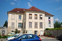 Photographie d'un bâtiment qui fut une église.