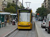 2040-es pályaszámú Siemens Combino Supra villamos a budapesti 6-os villamos vonalán, a Móricz Zsigmond körtéren