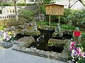 Swastika-shaped pond at Hasedera, Buddhist temple in Kamakura, Japan