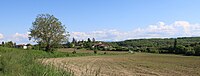 Panorama de Saint-Elix-Séglan avec les Pyrénées en arrière plan.