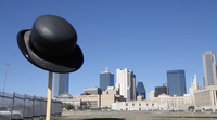 Giant bowler hat as roadside art in south Dallas, Texas.