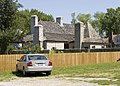 Maison Bolduc, in Ste. Genevieve, Missouri is a grander building in the same style as the Maison Bequette-Ribault.