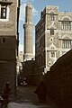 Houses in old Sana'a. Ibex and Bull were sacred animals in ancient Yemen. Yemenis put Ibex or Bull horns at top of houses to protect from evil eyes.[80]